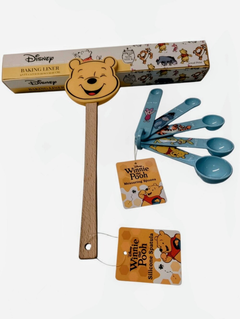 Winnie the Pooh Baking Essentials. Spatula, Measuring Spoons and Baking Liner.